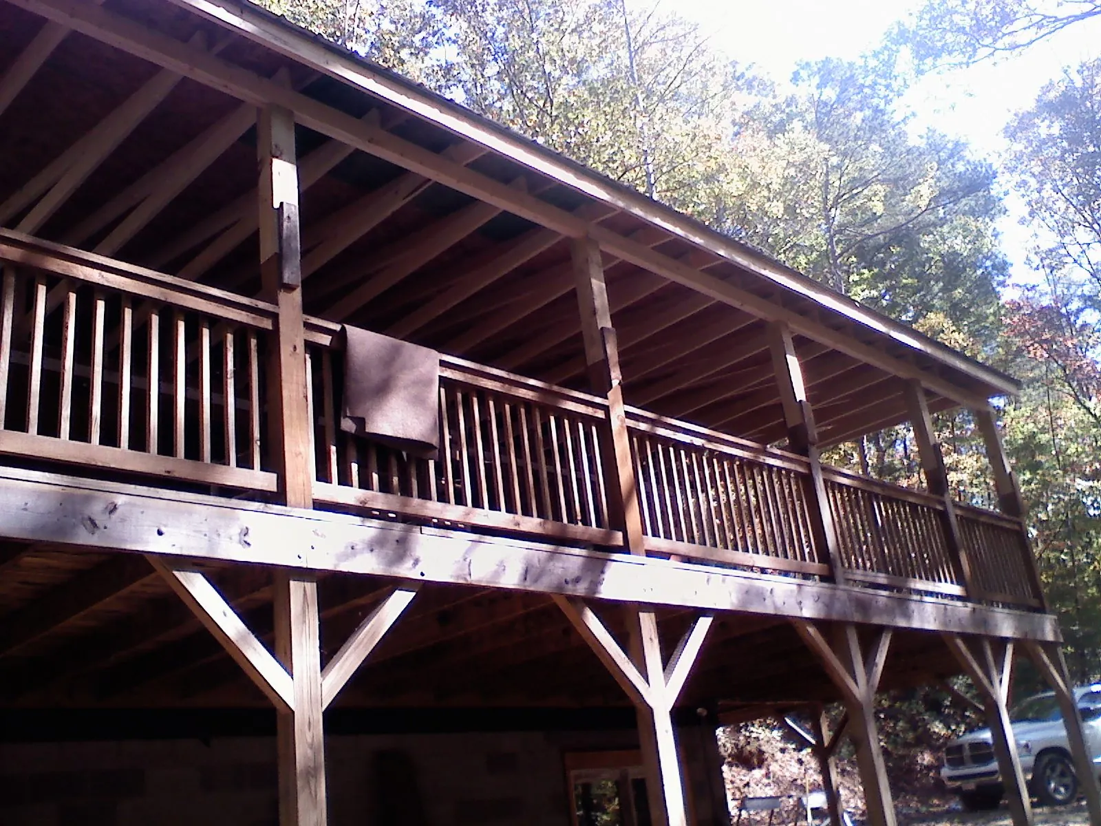 Timber framing under a new elevated porch and deck — Roof Leak Repair in Plevna by Roofing Brothers
